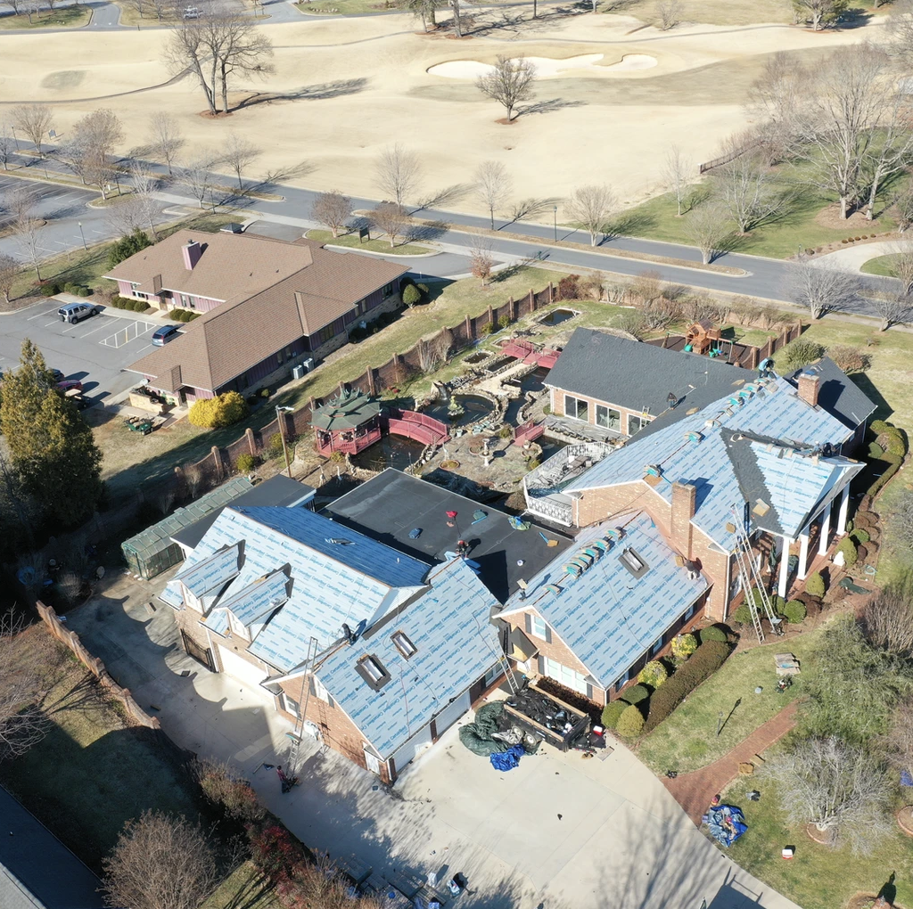 Asphalt shingle roofing installation for residential properties, providing a reliable and weather-resistant solution for your home.