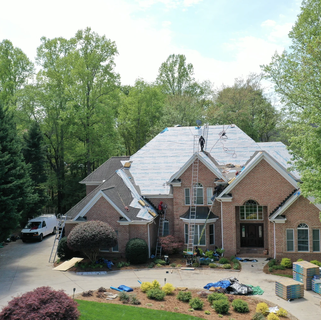 Residential asphalt shingle roofing, offering both style and durability to protect your home from the elements.