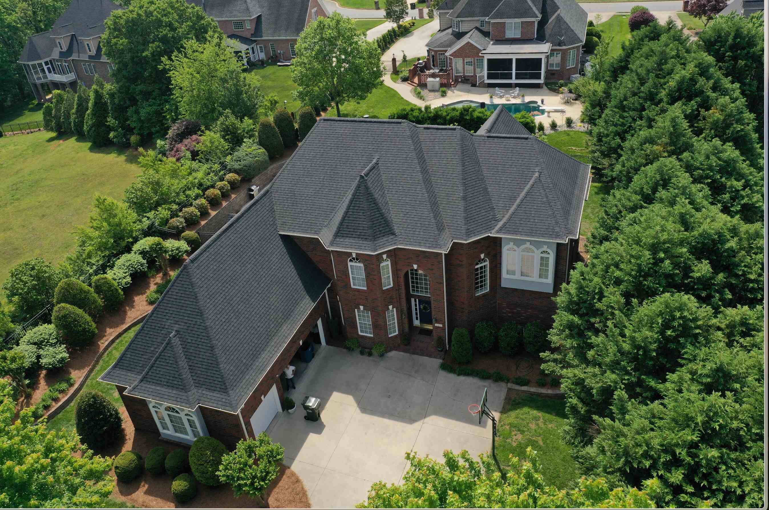 Newly completed asphalt shingle roof by experienced roofing contractors in Hickory NC